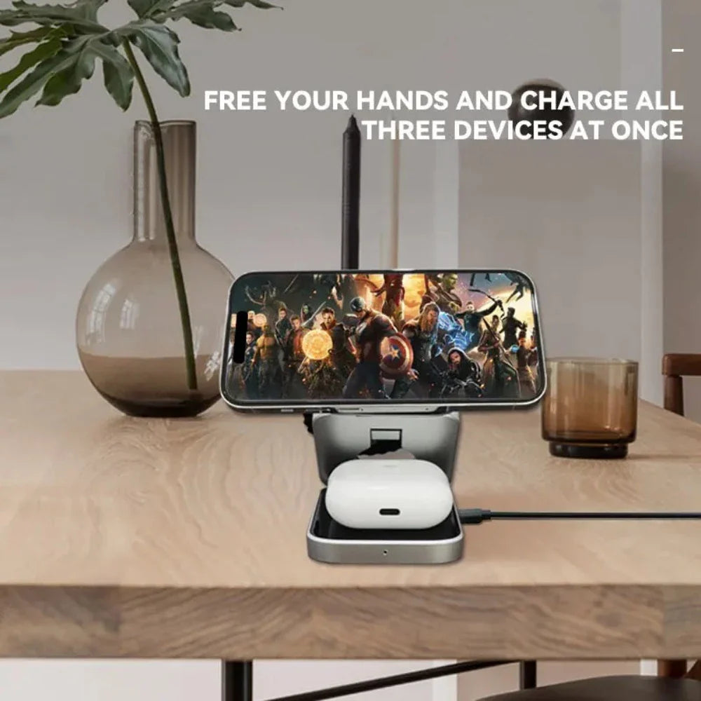 Foldable 3 in 1 wireless charging phone stand charging a smartphone and earbuds on a stylish table with plants and decor.